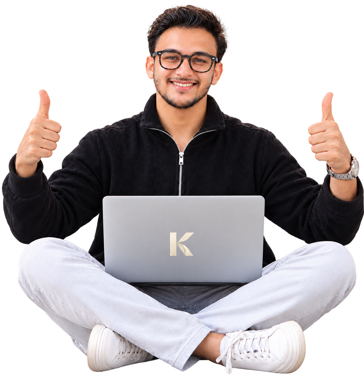 A smiling creative with a laptop bearing the Kairu Global logo